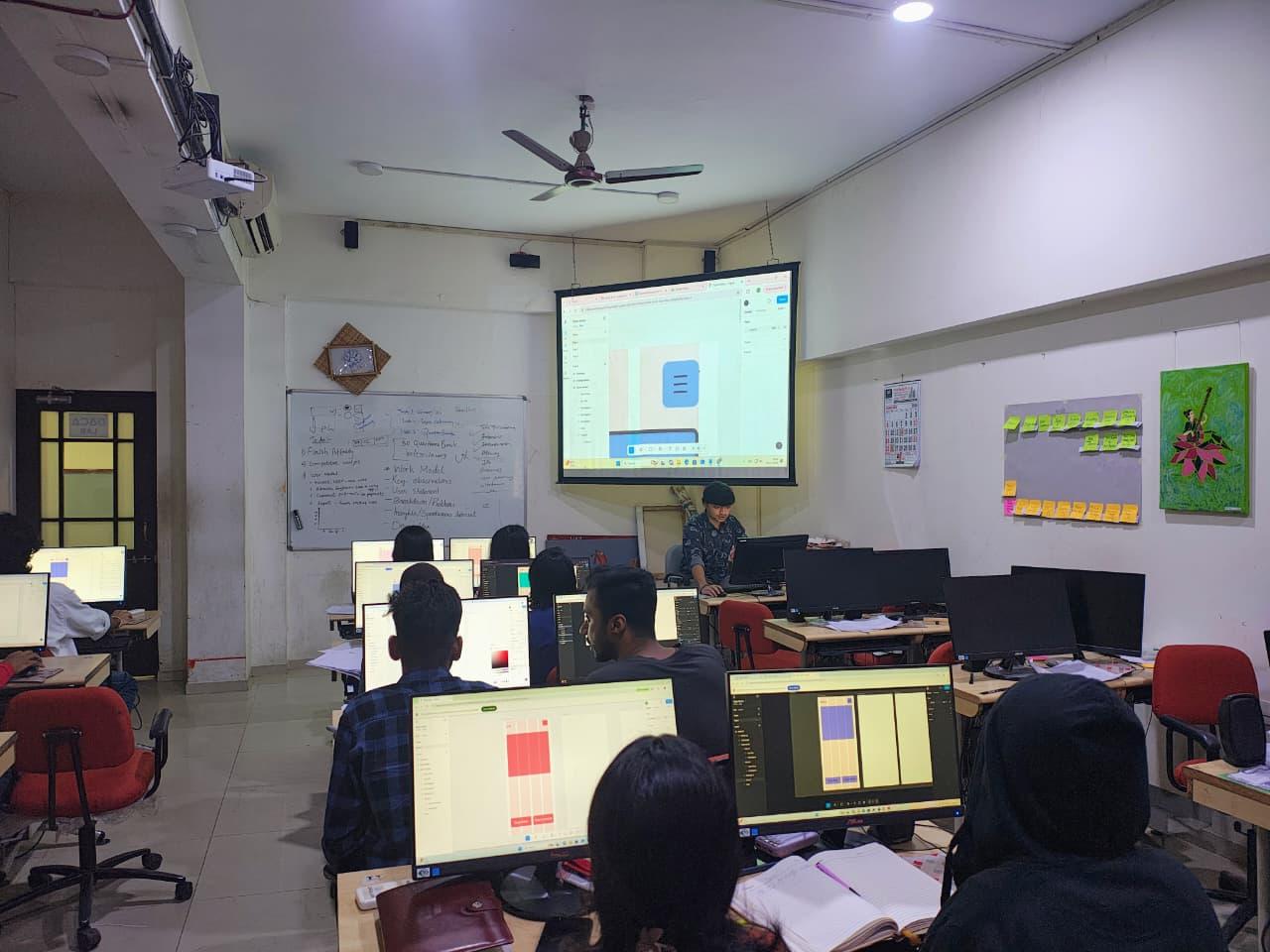 Sudhanshu teaching a Figma session to a class at MET College